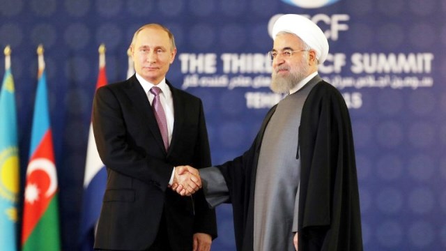 Putin Ruhani ilə Suriyanı müzakirə etdi