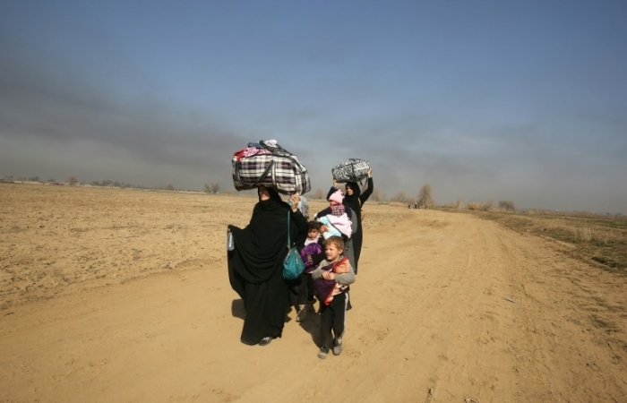 Mossoul: des centaines de civils fuient pour échapper aux combats