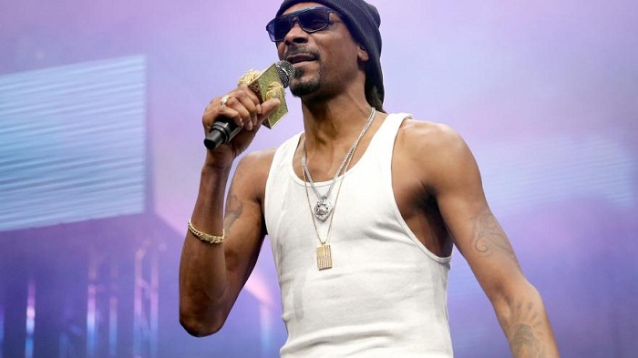 Une pom-pom girl attaque en justice Snoop Dogg et Wiz Khalifa