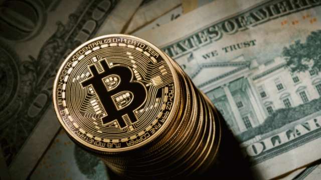 Le bitcoin franchit le seuil de 10.000 dollars