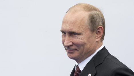 Putin Milan danışıqlarından razı qalıb 