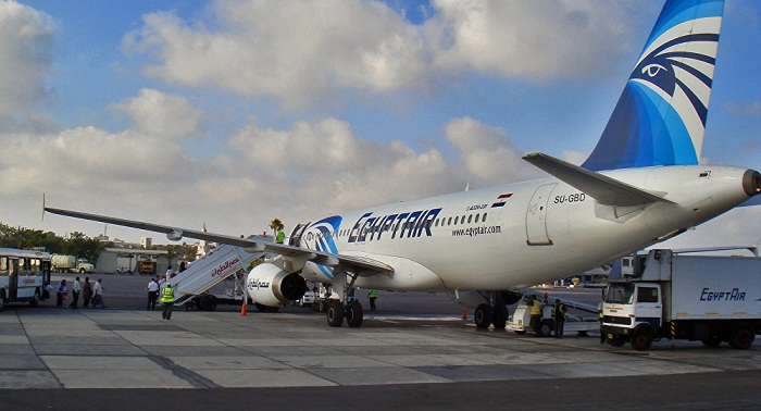 Several foreigners remain on board hijacked Egyptair plane 