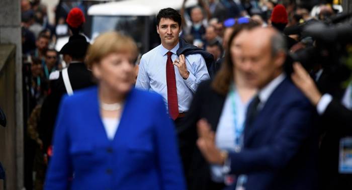 Quand Justin Trudeau impressionne Merkel avec ses chaussettes