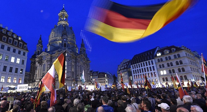 Up to 8,000 people attend Pegida anti-refugee rally in Germany`s Dresden