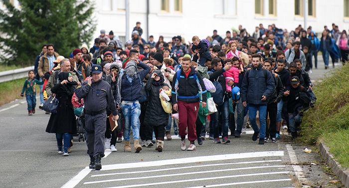 Merkel facing political isolation over refugee crisis failures