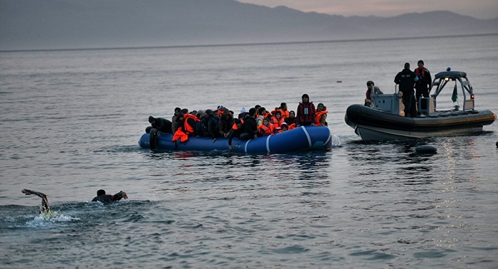Greek coast guard rescues about 70 migrants after boat runs aground