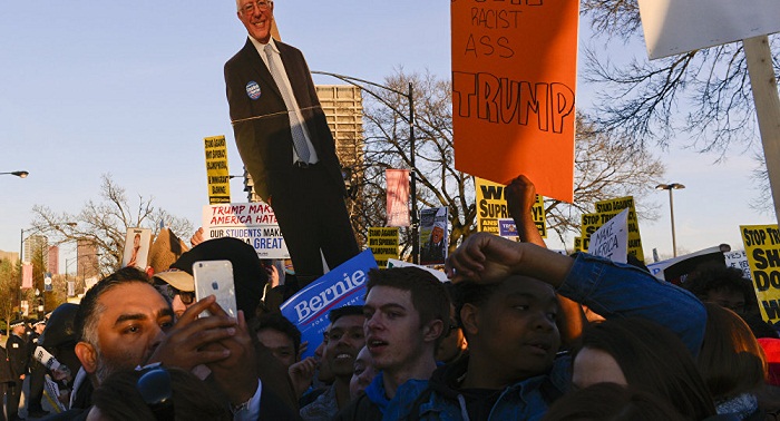 Trump postpones Chicago rally after massive protest outside venue