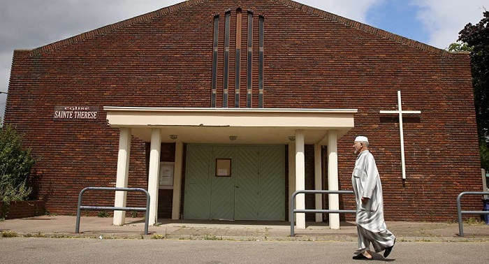 French Muslims attend Catholic mass after Normandy church attack 