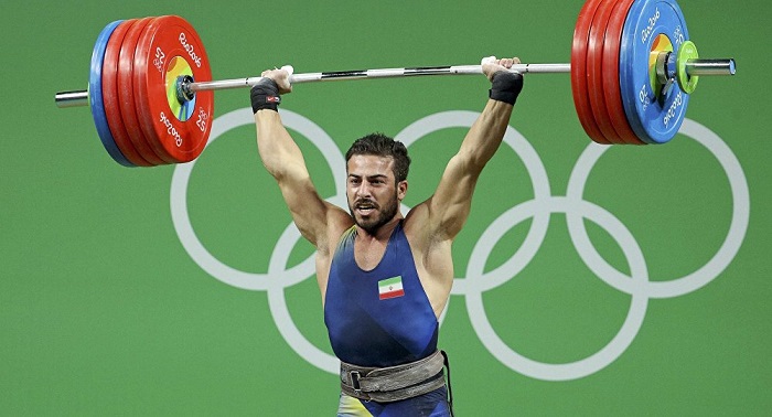 Iran’s weightlifter Rostami takes gold, sets new world record