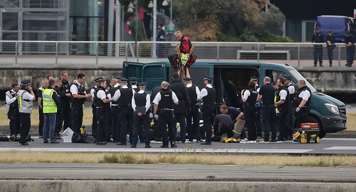 Police confront Black Lives Matter protesters blocking London Airport runway