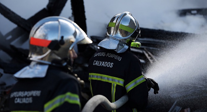 Fire breaks out at French Refugee Reception Center amid protests
