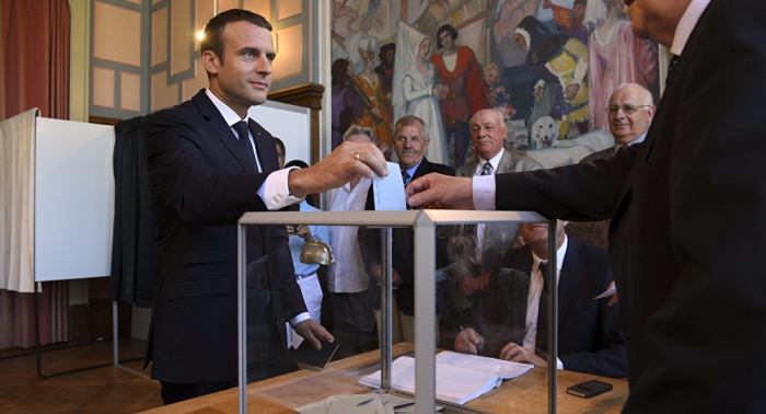 French President casts vote in second round of Parliamentary Election
