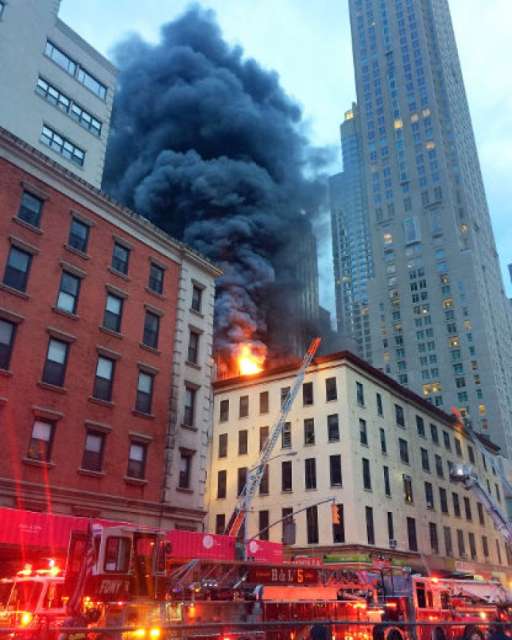 Firefighters battle large blaze in New York City