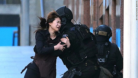 Busy Sydney streets fall silent during tense hostage standoff- PHOTOS