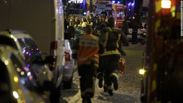 Paris attacks: At least 153 killed in gunfire and blasts - PHOTOS, VIDEO