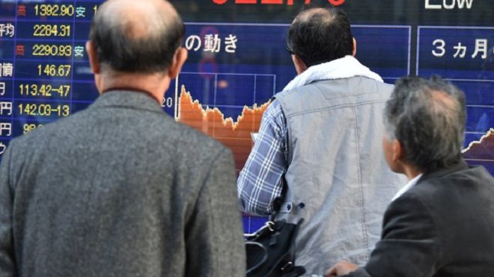 Japan`s shares up despite downbeat trade data