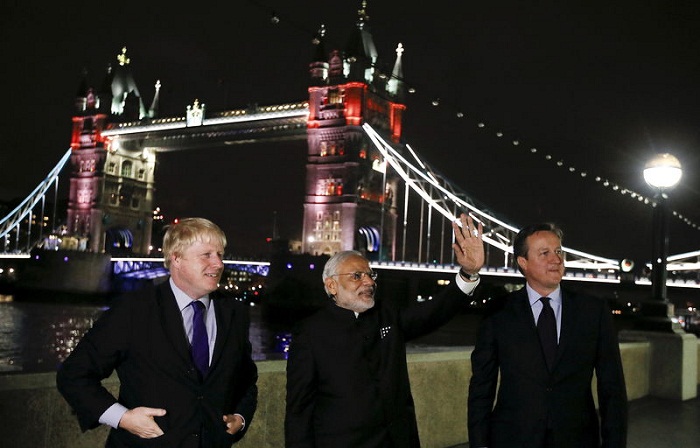 Britain, India sign over 9 billion pounds in deals despite protests