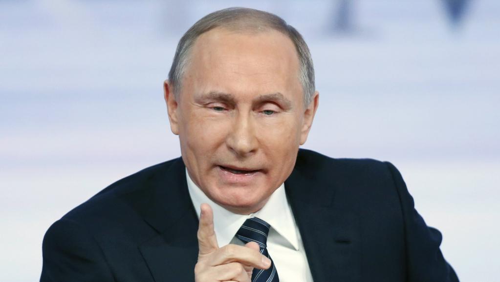Devant la presse, Poutine joue l`apaisement avec Washington