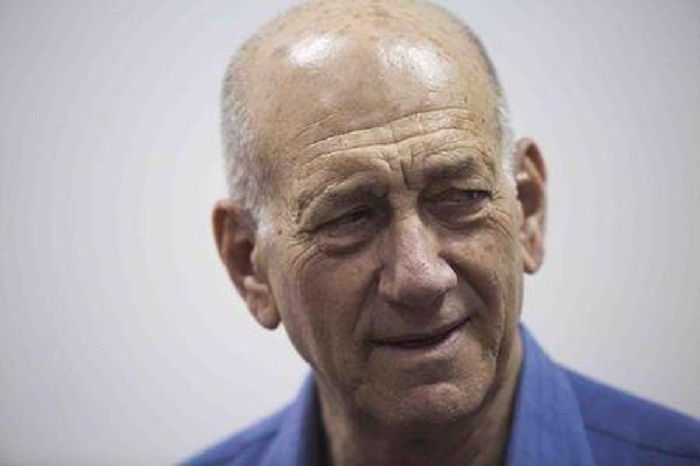 Israel top court cuts ex-PM Olmert`s jail term for bribery to 18 months