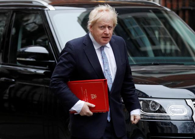 Dividing UK government, Johnson demands boost to health funding 