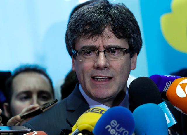 Spanish court says Puigdemont must attend parliament in person
 