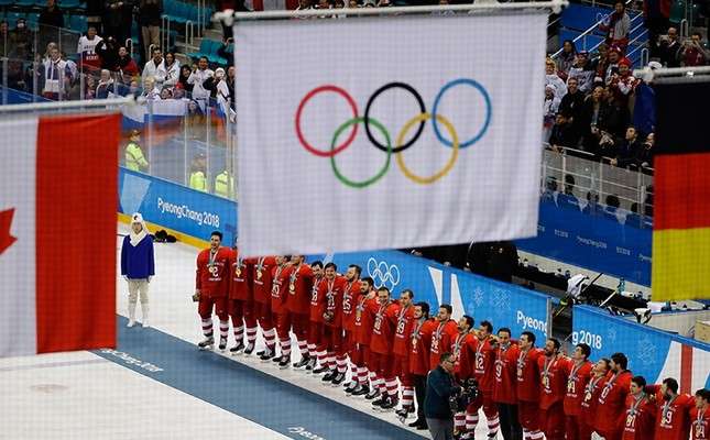 Russians win hockey gold as IOC keeps flag ban in place