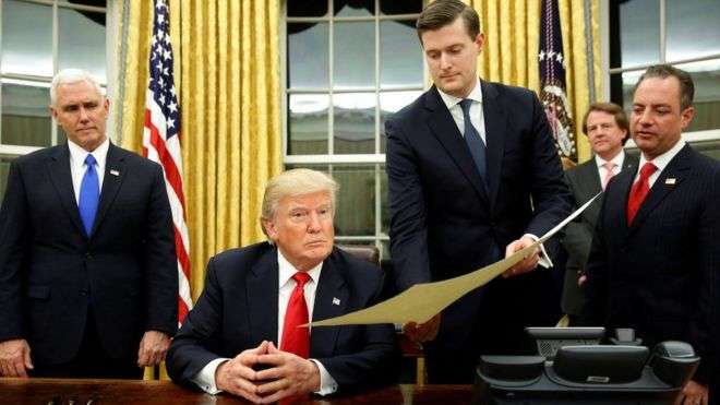 White House aide Rob Porter quits as ex-wives allege abuse