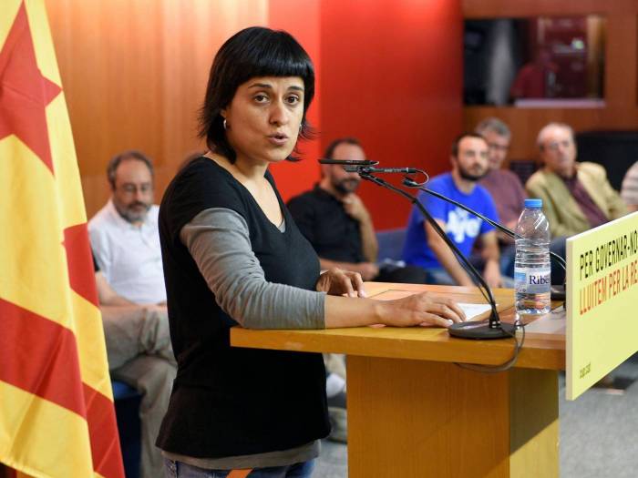 Catalan MP and leading independence activist flees country to avoid facing trial in Madrid