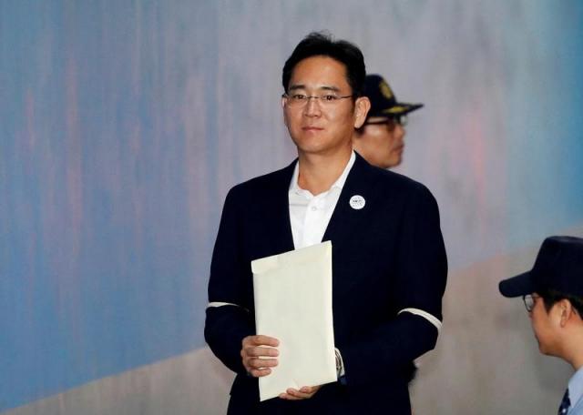 South Korean appeals court sets Samsung scion Lee free
 