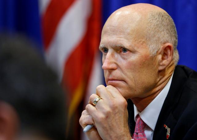 Florida governor proposes new gun sale limits after school shooting  