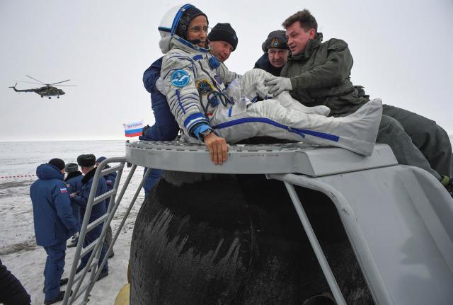 U.S.-Russian crew returns from space station: NASA TV