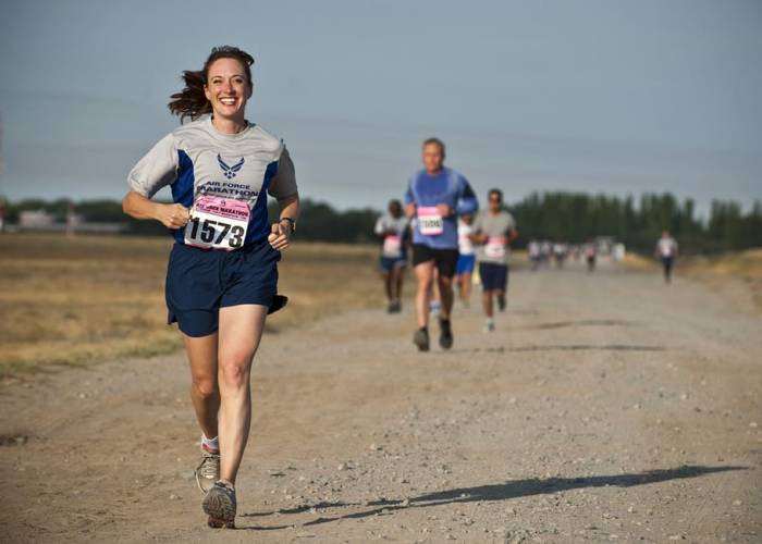 A smile will improve your run, research finds