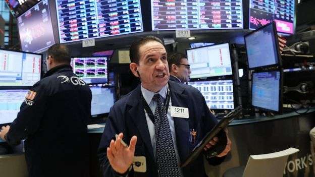 سوق الأسهم الأمريكية تغلق على ارتفاع بعد تداولات متقلبة