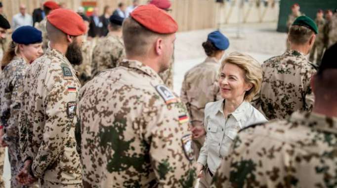 German defense minister says no timetable for troop withdrawal from Afghanistan