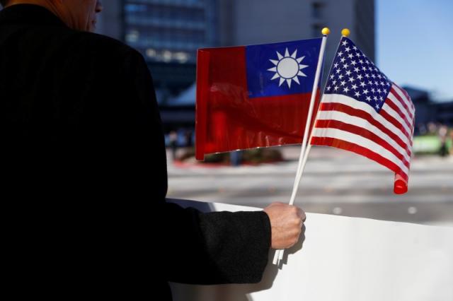 China warns Taiwan playing with fire over U.S. bill