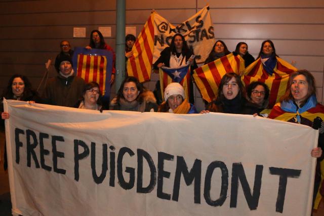 Catalan ex-head Puigdemont to appear in German court after protests flare