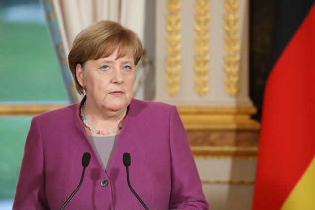 Merkel presses over migration as 