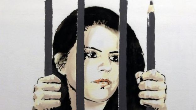 لوحة عملاقة لبانسكي في نيويورك دفاعا عن رسامة خلف القضبان في تركيا
