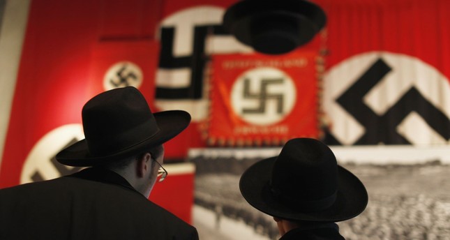 German theater to offer free tickets to swastika wearers for 