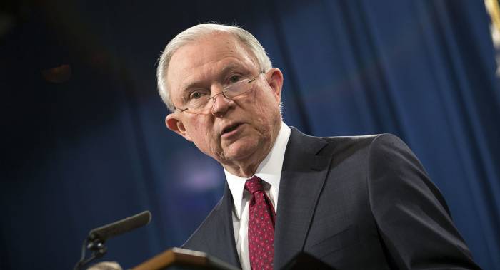 Justice Dept. to set quotas for judges to clear immigration cases
 