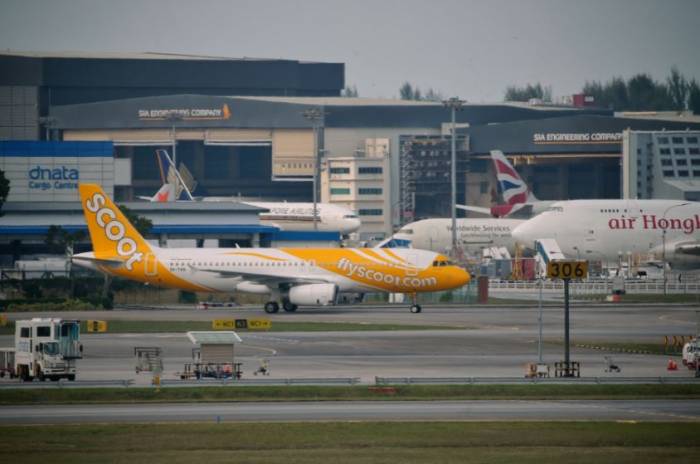 Singapore police arrest flight passenger for bomb hoax