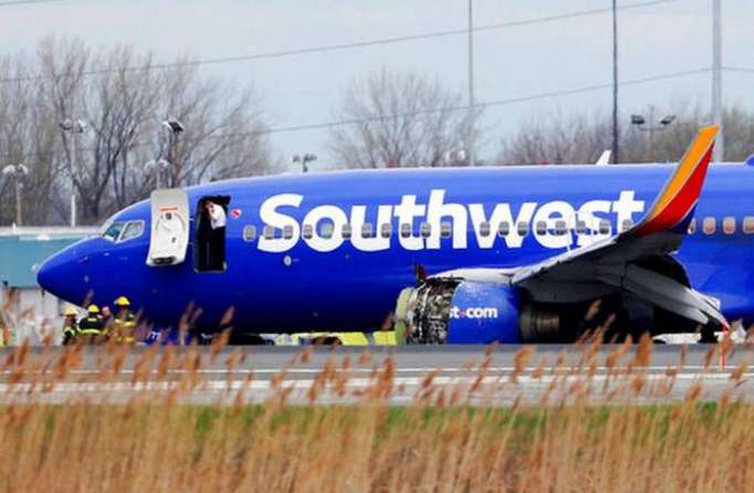One dead after engine explodes midair on Southwest flight
 