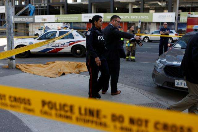 Driver kills 10, injures 15 plowing van into Toronto sidewalk crowd
 