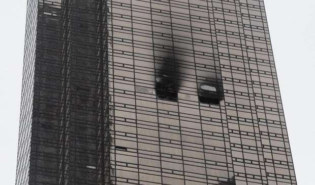 Fire at Trump Tower leaves man dead and 6 firefighters injured