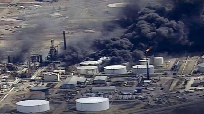 Smoky fire out at Wisconsin refinery after blast injures at least 11, forcing evacuations