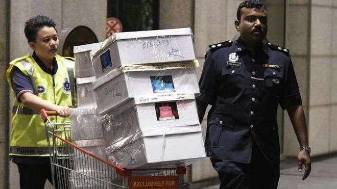 Malaysia police seize cash and luxury goods in Najib-linked raids