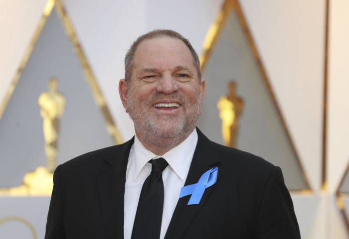 Harvey Weinstein turns himself in for alleged sex crimes