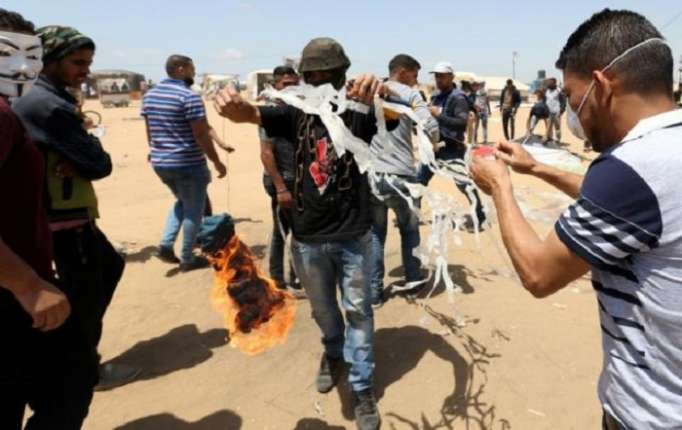Israeli gunfire kills Palestinian as border protest builds to climax