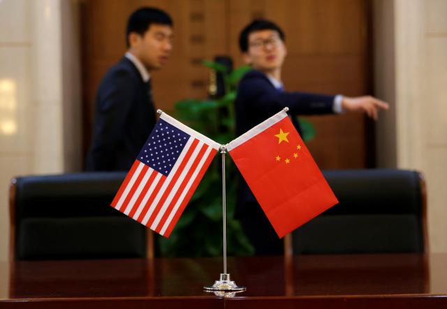 China slams surprise U.S. trade announcement, says ready to fight  