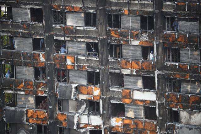 UK could ban combustible materials in tall buildings after Grenfell fire  